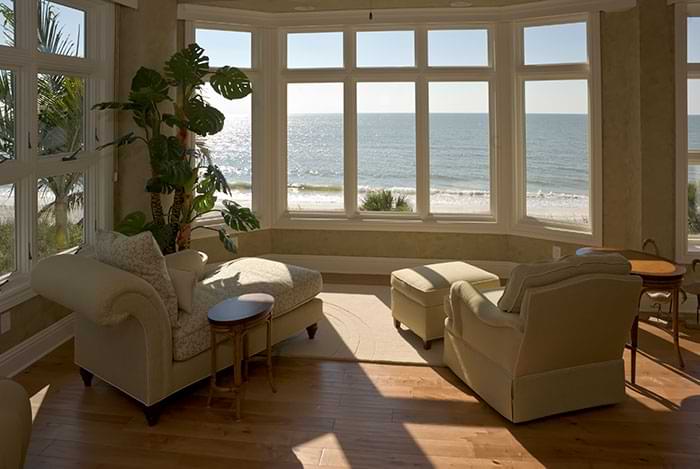 image of a window to the beach